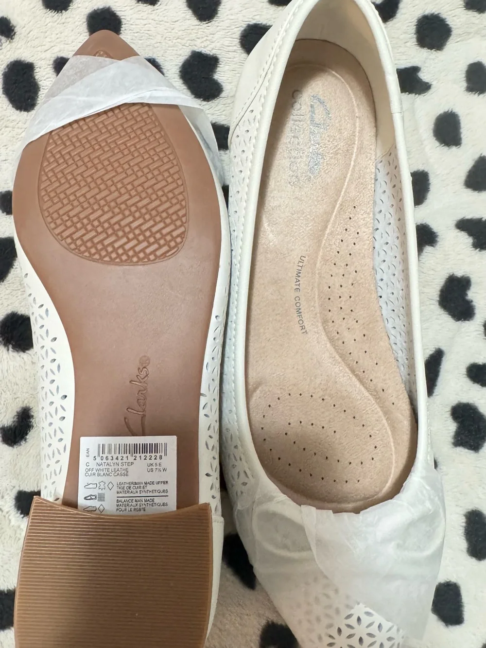Comfortiva White Laser-Cut Bow Ballet Flats